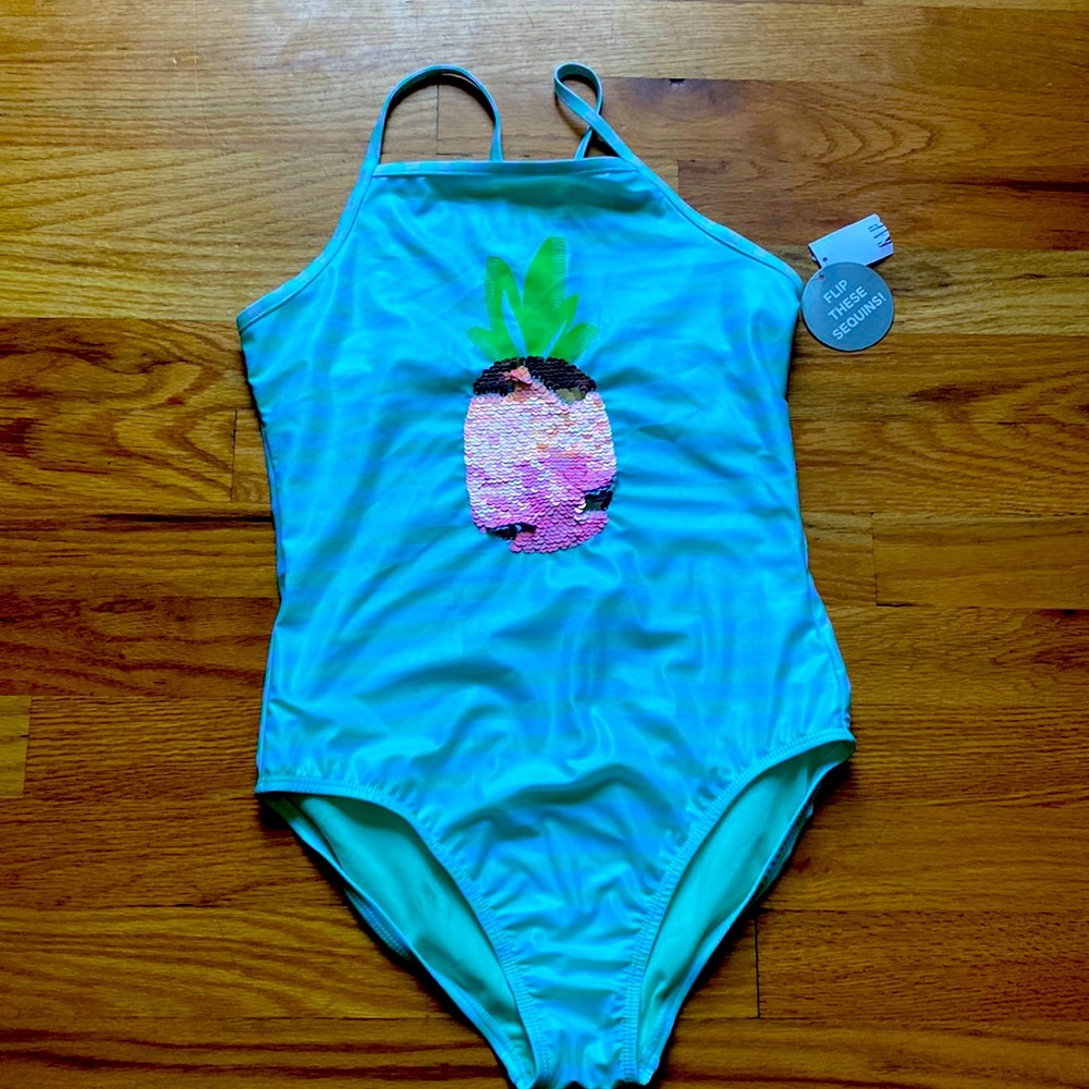 New girls bathing suit with tag’s